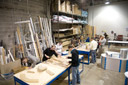 Designers in Woodshop developing a client's prototype